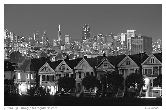 Victorians at Alamo Square and skyline, night. San Francisco, California, USA (black and white)