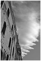 Old brick building and serrated cloud, sunset, Fisherman's Wharf. San Francisco, California, USA (black and white)