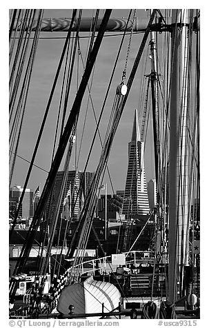 Transamerica Pyramid  seen through the masts of the Balclutha. San Francisco, California, USA (black and white)