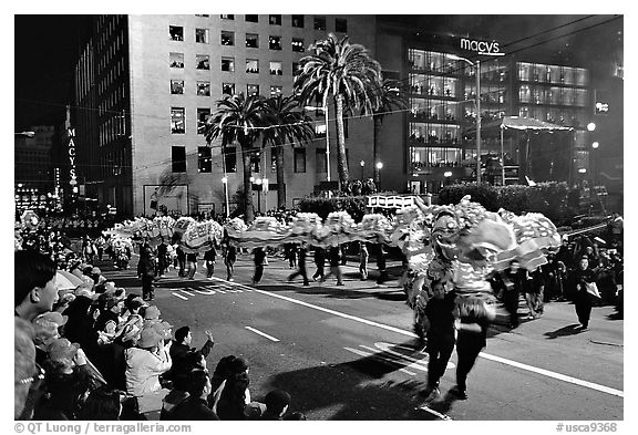 Dragon dancing during the Chinese New Year celebration, Union Square. San Francisco, California, USA (black and white)