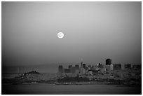 Moonrise over the city. San Francisco, California, USA (black and white)