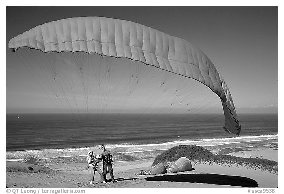 Paragliders practising in sand dunes, Marina. California, USA