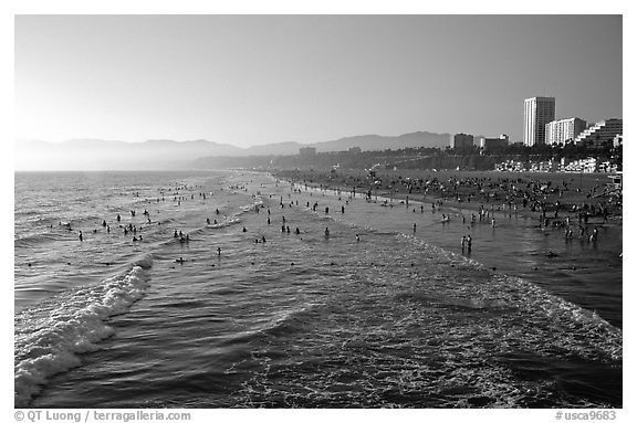 Beach seen from the pier, late afternoon. Santa Monica, Los Angeles, California, USA (black and white)