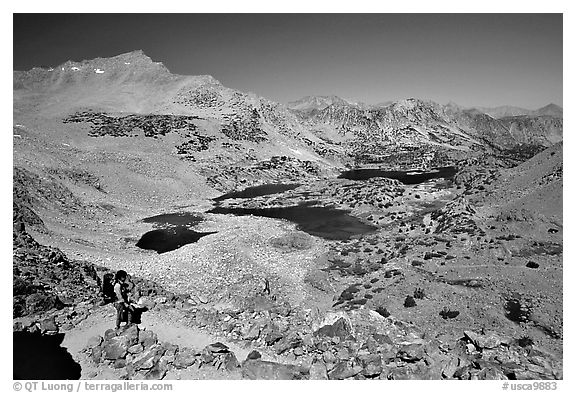 Backpacker on Bishop Pass trail, Inyo National Forest. California, USA (black and white)