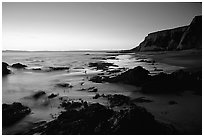 Rocks and surf, Sculptured Beach, sunset. Point Reyes National Seashore, California, USA ( black and white)