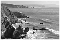 Cliffs and Point Bonita Lighthouse, late afternoon. California, USA ( black and white)
