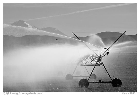 Irrigation machine and Mt Shasta. California, USA