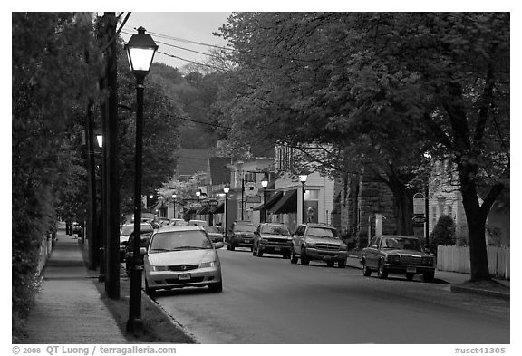 Street and storefronts at dusk, Essex. Connecticut, USA (black and white)