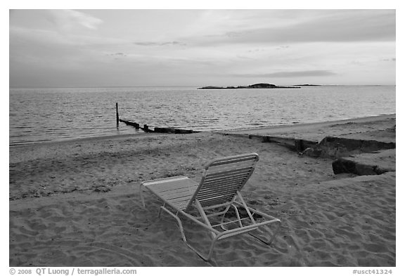 Beach chair at sunset, Westbrook. Connecticut, USA (black and white)