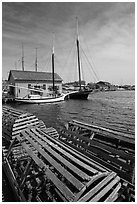 Wooden crab traps and historic ships. Mystic, Connecticut, USA (black and white)