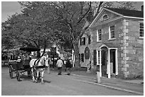 Horse carriage and bank building. Mystic, Connecticut, USA (black and white)