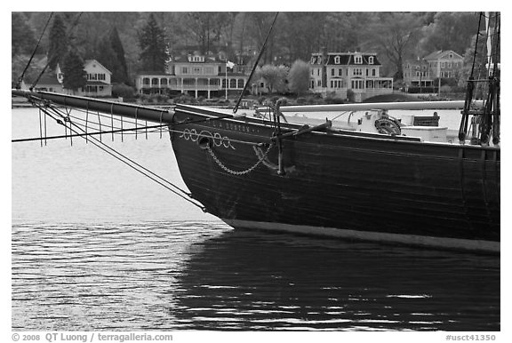 LA Dunton schooner and houses across the Mystic River. Mystic, Connecticut, USA (black and white)