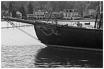 LA Dunton schooner and houses across the Mystic River. Mystic, Connecticut, USA ( black and white)