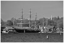 Three masted ship, Mystic River, and church. Mystic, Connecticut, USA ( black and white)