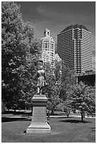 Statue in park and high-rise buildings. Hartford, Connecticut, USA ( black and white)