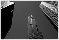 Upwards view of sears tower framed by other skyscrappers. Chicago, Illinois, USA (black and white)