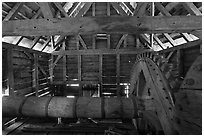 Waterwheel shaft inside forge, Saugus Iron Works National Historic Site. Massachussets, USA ( black and white)