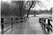 North Bridge leading to Minute Man statue, Minute Man National Historical Park. Massachussets, USA (black and white)