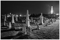 Cemetery and Pilgrim Monument at night, Provincetown. Cape Cod, Massachussets, USA ( black and white)
