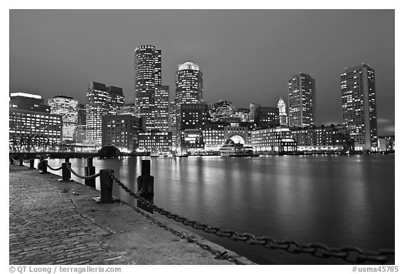 Night skyline above harbor. Boston, Massachussets, USA (black and white)