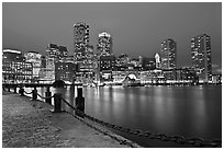 Night skyline above harbor. Boston, Massachussets, USA ( black and white)
