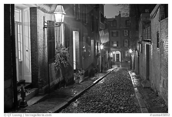 Picturesque cobblestone street on rainy night, Beacon Hill. Boston, Massachussets, USA (black and white)