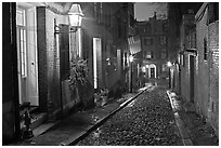 Picturesque cobblestone street on rainy night, Beacon Hill. Boston, Massachussets, USA ( black and white)