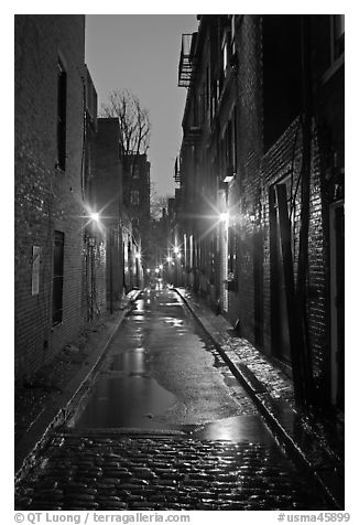 Dark alley on rainy night, Beacon Hill. Boston, Massachussets, USA (black and white)