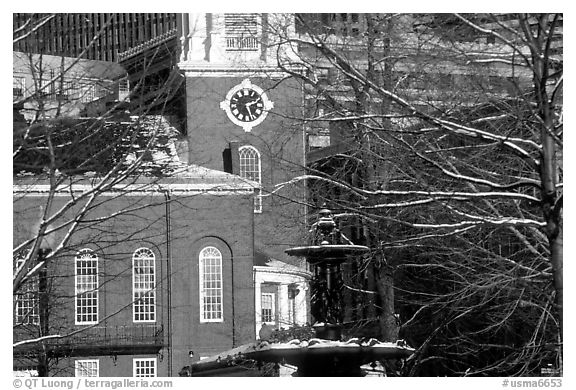 Historic church and snow covered branches. Boston, Massachussets, USA