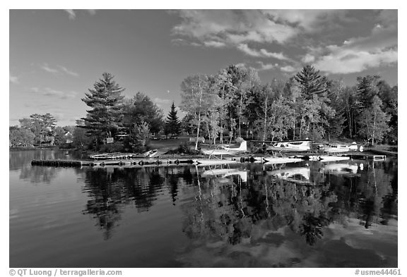 Seaplanes and autumn foliage, West Cove, late afternoon, Greenville. Maine, USA (black and white)