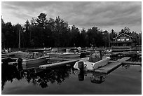 Boats in Beaver Cove Marina at dusk, Greenville. Maine, USA (black and white)