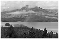 Autumn scenery with lake and clouds lifting up. Maine, USA (black and white)