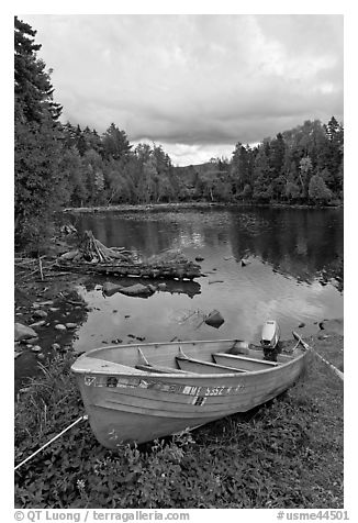 Small boat and cove, Lily Bay State Park. Maine, USA