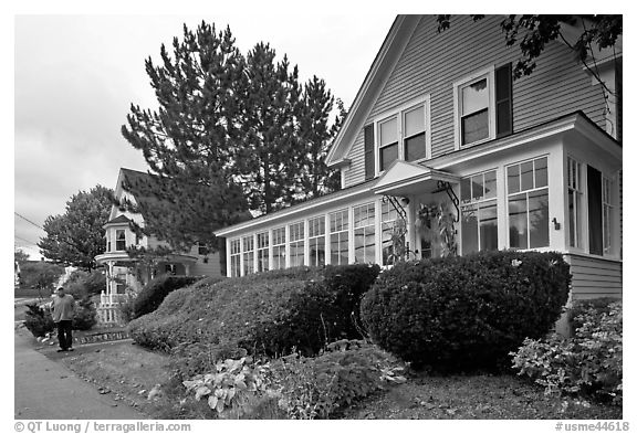 House with New-England style porch, Millinocket. Maine, USA (black and white)