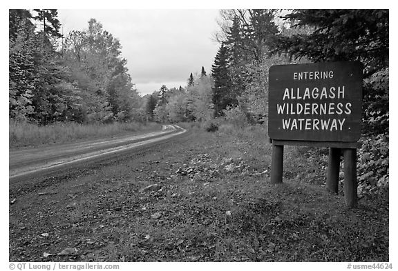 Road with Allagash wilderness sign. Allagash Wilderness Waterway, Maine, USA