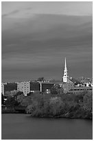 White steepled church and brick buildings. Bangor, Maine, USA (black and white)