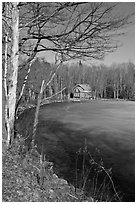 House by frozen lake. Maine, USA (black and white)