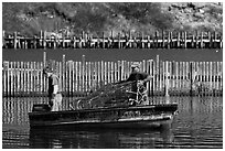 Lobstermen hauling traps. Stonington, Maine, USA (black and white)