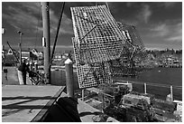 Lobsterman loading lobster traps. Stonington, Maine, USA ( black and white)