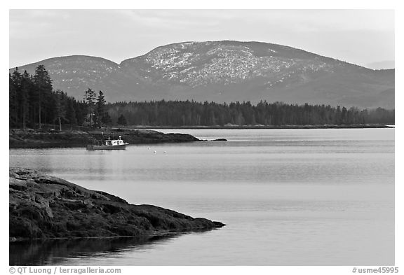 Frenchman Bay with snow-covered Cadillac Mountain in winter. Maine, USA (black and white)
