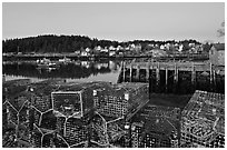 Lobster traps, pier, and village at dawn. Stonington, Maine, USA ( black and white)
