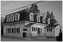 Post office in federal style at dusk. Stonington, Maine, USA (black and white)