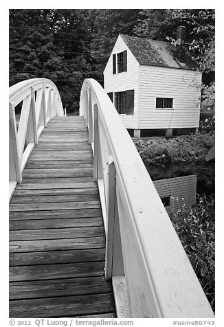 White wooden bridged and house. Maine, USA