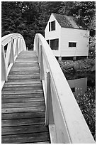 White wooden bridged and house. Maine, USA (black and white)