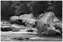 Whitewater of Wassatotaquoik Stream with boulders at Orin Falls. Katahdin Woods and Waters National Monument, Maine, USA ( black and white)