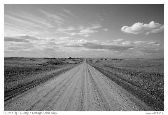 Gravel road in open prairie. North Dakota, USA (black and white)