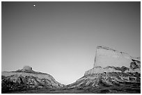 Scotts Bluff, Mitchell Pass, and  South Bluff at sunrise with moon. Scotts Bluff National Monument. South Dakota, USA (black and white)