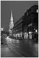 White-steepled Church and street with brick buildings by night. Portsmouth, New Hampshire, USA (black and white)