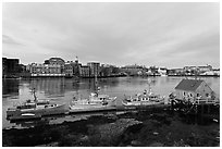 Boats, river, and skyline, early morning. Portsmouth, New Hampshire, USA ( black and white)