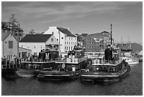 Tugboats and waterfront buildings. Portsmouth, New Hampshire, USA ( black and white)